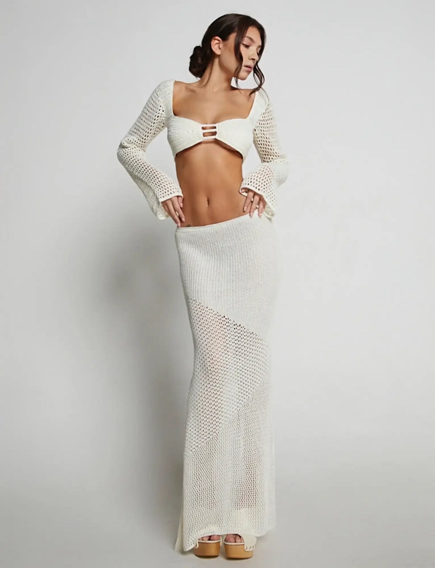 Eden set, a knitted mesh skirt and blouse in a hollow design,